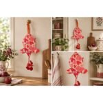 Dispenser organizador de bolsas gallina Etelvina blanca corazones rojos en uso en la cocina