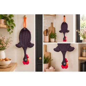 Dispenser Organizador de Bolsas Gallina Etelvina Lunares Chicos Negro y Fucsia en uso en la cocina